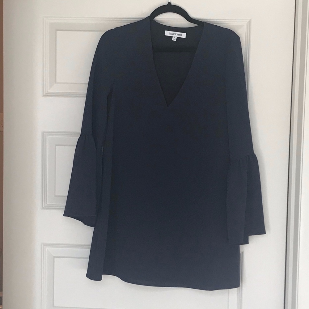 Navy dress with v-neck and bell sleeves